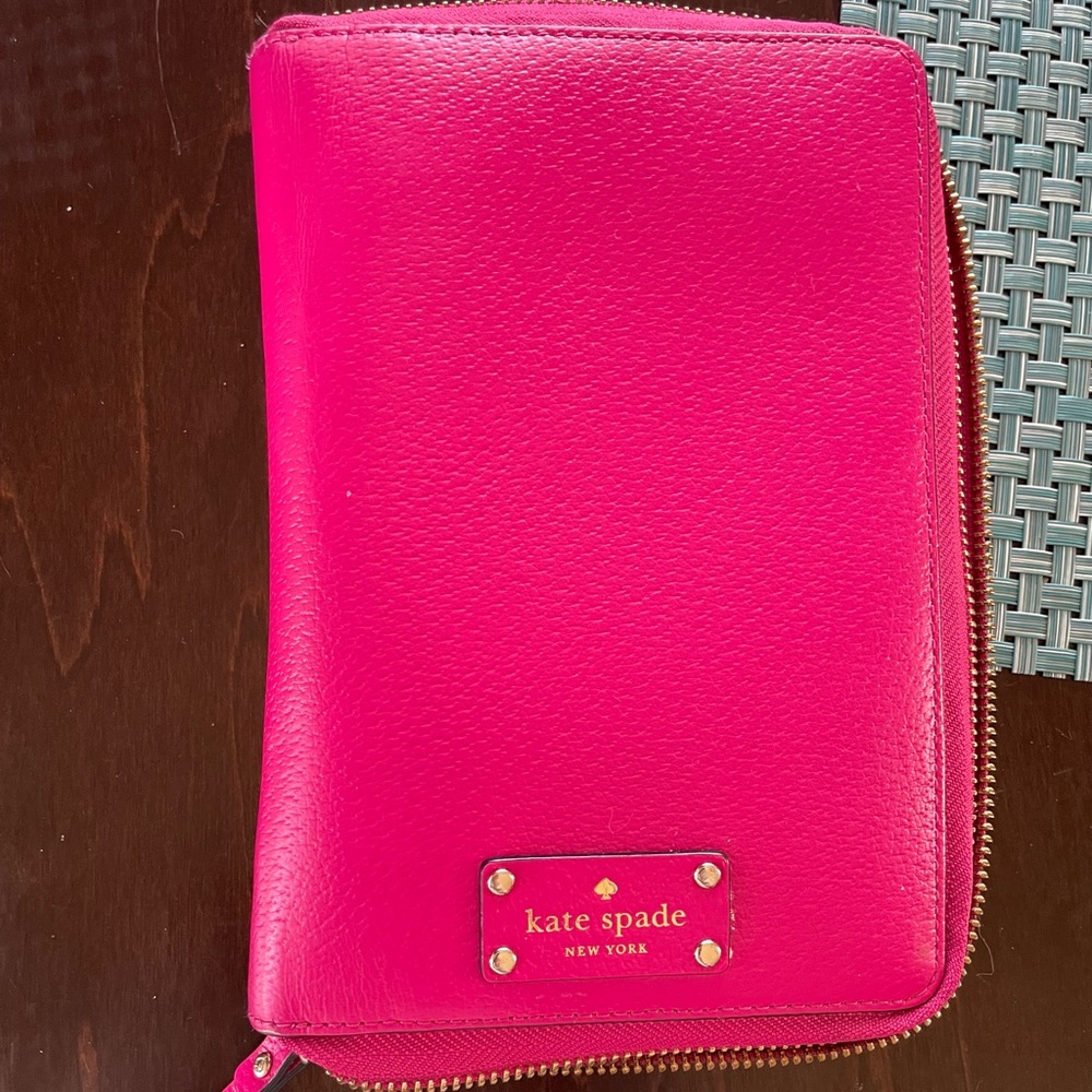 Gently used Kate Spade pink planner.